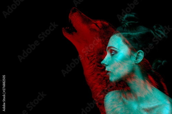 Fototapeta Gothic girl and wolf double exposure on black background. Werewolf concept. space for text