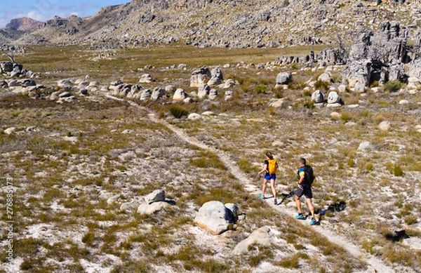 Fototapeta Trail runners enjoying a perfect trail in the Cederberg mountains of South Africa