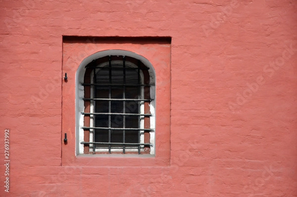 Obraz Antique brick wall with an arched window. Texture.