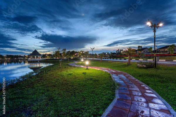 Fototapeta Walkways in the park between the evening.