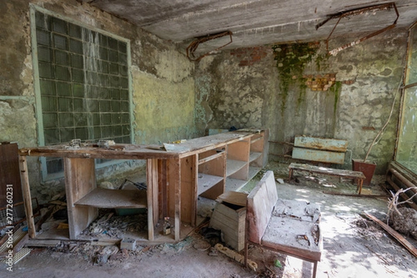 Obraz  Abandoned hospital reception in Chernobyl Exclusion Zone, Ukraine - June 2019 Ghost City Prypiat abandoned after Chernobyl disaster - nuclear accident in Soviet Union that occurred on 26 April 1986.