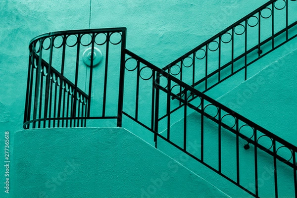 Obraz blue and black railing wall