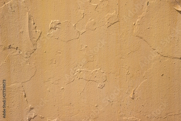 Fototapeta Old Dirty Plaster Wall, With Flakes Of Paint. Rough Surface. Old Weathered Painted Background Texture. Vintage Scratch Grunge Urban Background. Distress texture for your design.