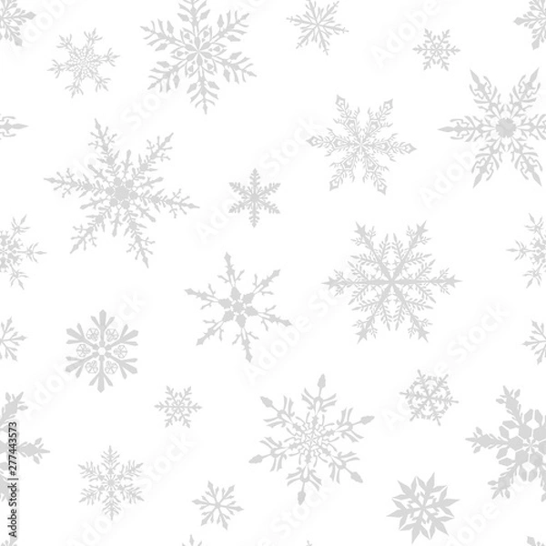 Fototapeta Christmas seamless pattern of complex big and small snowflakes in gray colors on white background