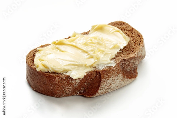 Fototapeta butter with bread isolated on white background