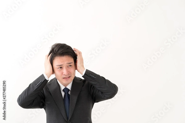 Obraz 悩むビジネスマン
