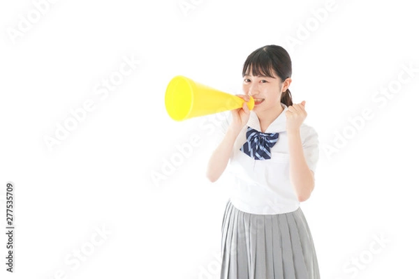 Fototapeta スポーツの応援をする若い女性