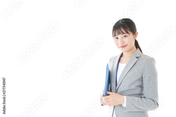 Fototapeta オフィスで働く若いビジネスウーマン