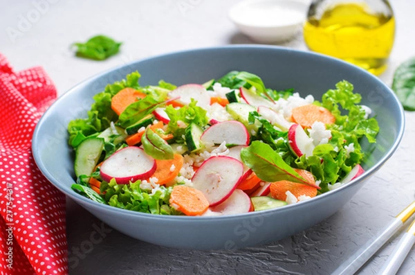 Fototapeta Vegetable Salad, Bright Summer Salad with Rice and Vegetables, Vegetarian Food
