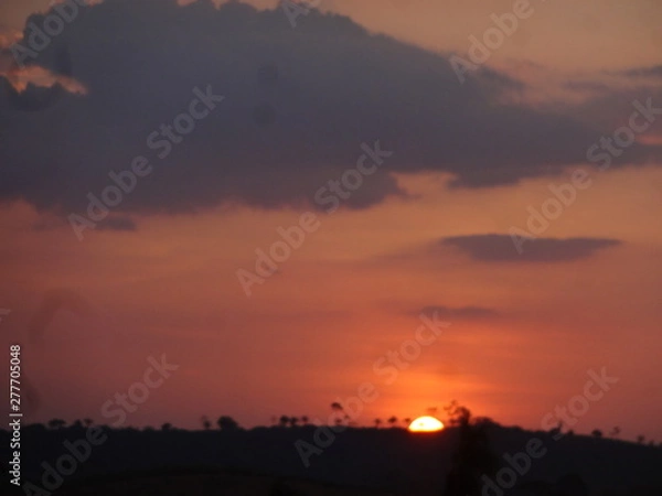 Fototapeta sunset in city