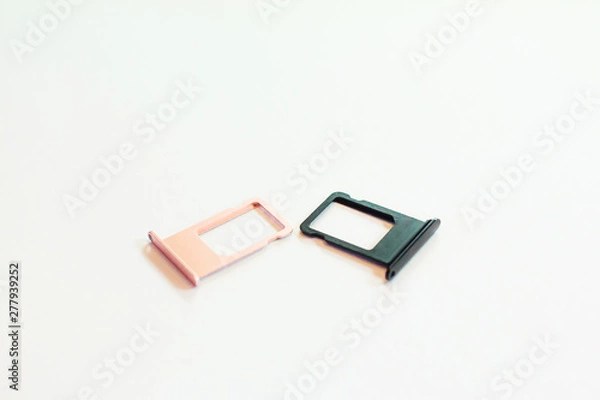 Fototapeta The SIM tray black and pink is used by the manufacturer. In the shop Real place, white background clear