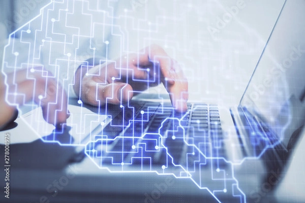 Fototapeta Man typing on keyboard background with brain hologram. Concept of big Data.