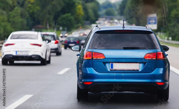 Fototapeta Cars in row on highway in traffic jam 