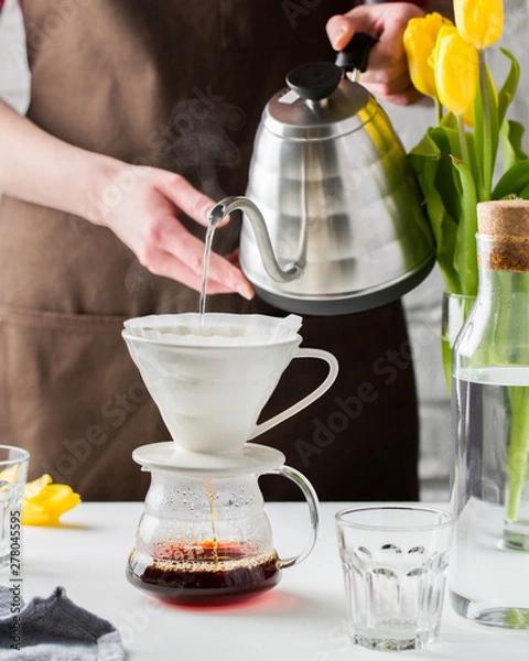 Obraz Vintage glass original coffee glass maker with hot brown beverage. One of the step of making fantastic joe
