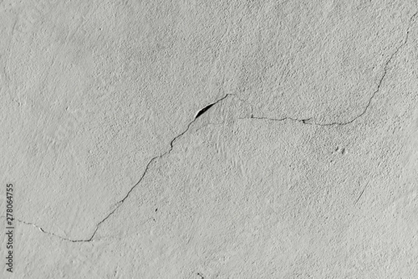 Obraz Texture. An old concrete wall with a crack leading diagonally across the image.