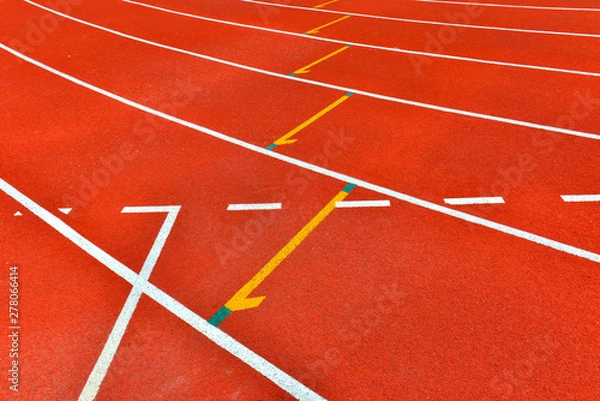 Fototapeta Red running track in stadium. 