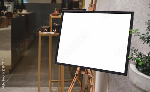 Fototapeta Mockup billboards or white promotion poster displayed on the front of the restaurant, coffee shop Promotion information for marketing announcements and details