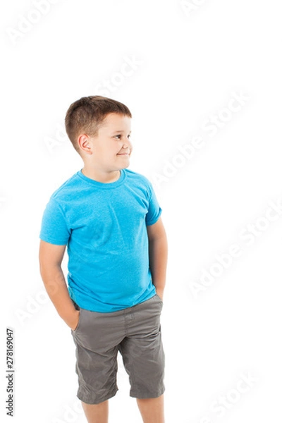 Fototapeta Adorable little boy looking on copy space. Isolated on white background