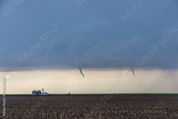 Fototapeta St Francis, Kansas, USA - June 29th, 2019: Developing twin tornadoes in Kansas, USA