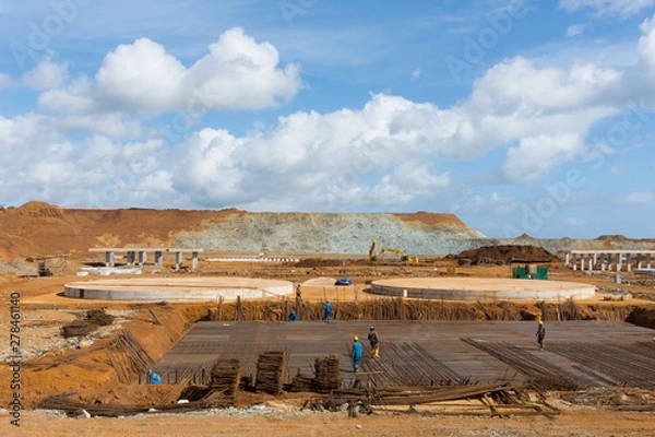 Obraz Construction workers are tying steel bars at the construction site