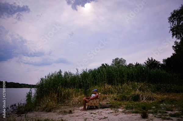 Fototapeta man and child by the river