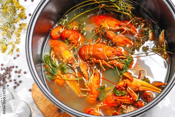 Obraz Boiled crayfish in a bowl of the cooker with spices, mustard and greens. 