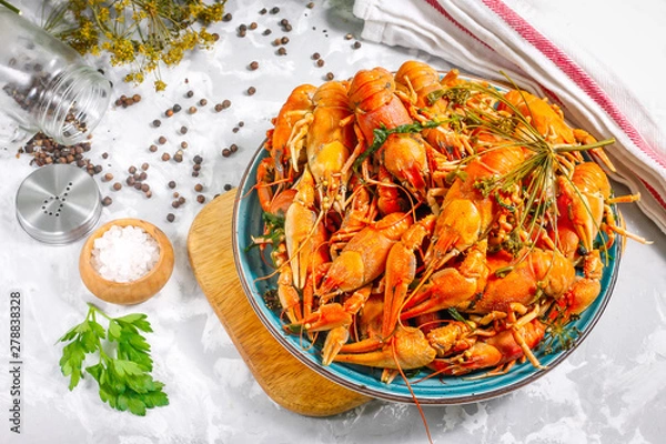 Obraz Boiled crayfish with spices. Boiled crayfish on a plate, on a concrete background. Natural product.