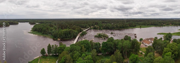 Fototapeta Aerial panorama view of Gysinge with the bridge over the river Dalälven and the entrance and information to the national park. 