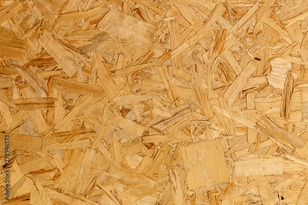 Fototapeta close up pressed wooden panel background texture of oriented strand board - OSB wood
