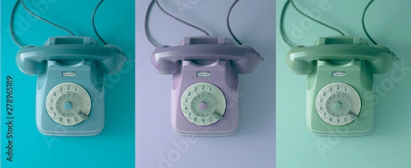 Obraz Trzy zabytkowe telefony z kolorowym tłem.