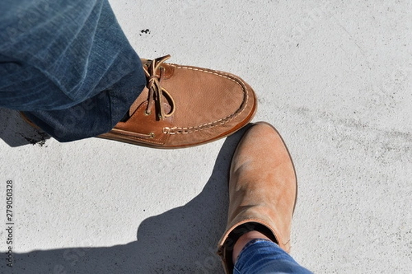 Obraz Two brown shoes on a gray background