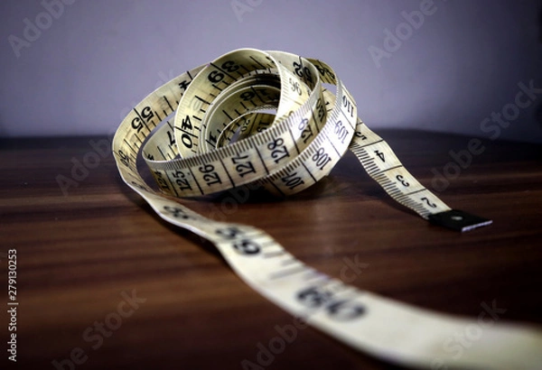 Obraz old tailor measuring tape