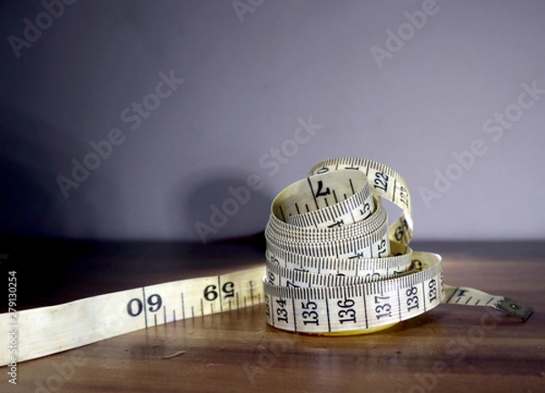 Obraz old tailor measuring tape