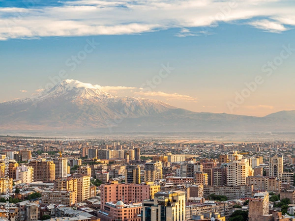 Fototapeta Beautiful cityscape of Yerevan made at sunset from the top of Cascade