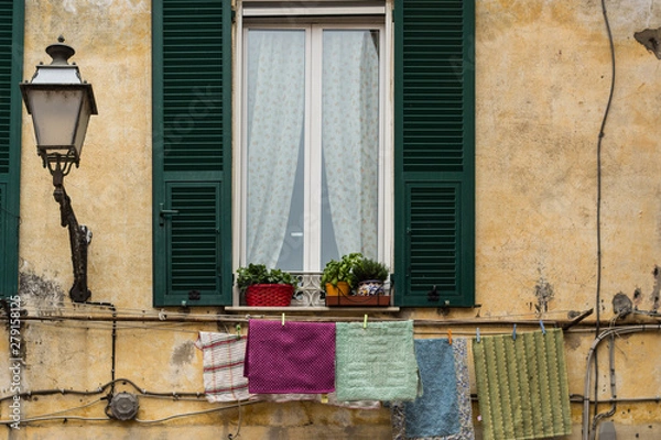 Obraz Italian window  with clothes hanging