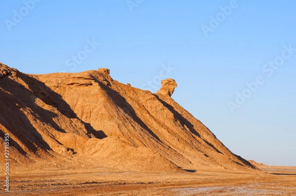 Fototapeta Mountain "Head of camel" in Sahara desert, Ong Jemel, Tunisia