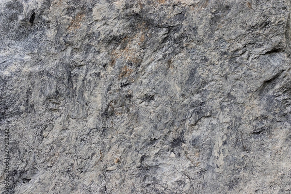 Obraz Dark gray stone surface is porous. This is a horizontal cement-concrete background. Texture of stone.