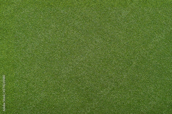 Fototapeta An artificial grass background, top view