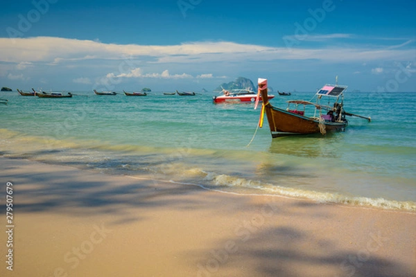 Obraz Thai traditional wooden longtail boat and beautiful sand Railay Beach in Ao nang,Krabi,Thailand.