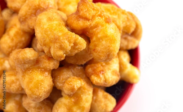 Fototapeta Caramel Puff Corn Popcorn on a White Background