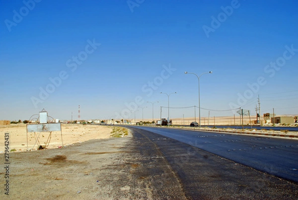 Fototapeta A section of the Kings Highway follows the ancient trading route between Amman and Petra in Jordan