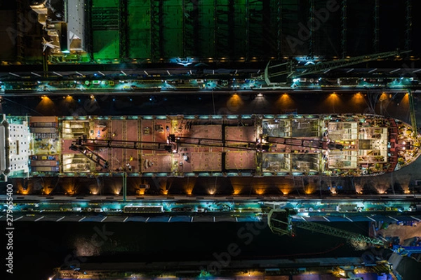 Fototapeta shipyard industry large on the sea at night in Thailand aerial view