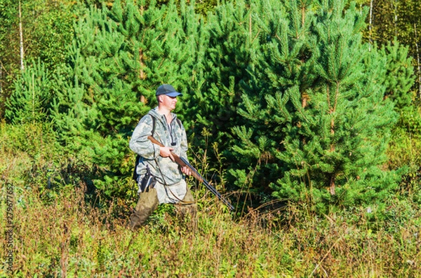 Fototapeta Hunting in autumn forest