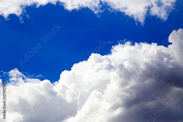 Obraz In the sky with white clouds.