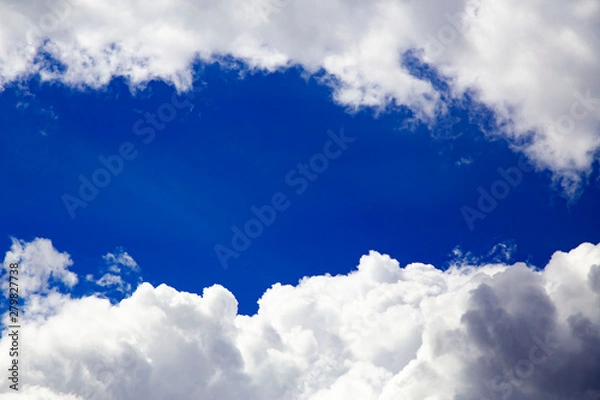 Obraz In the sky with white clouds.