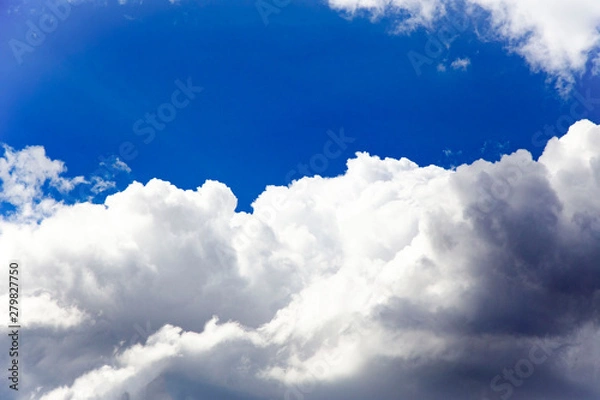 Obraz In the sky with white clouds.