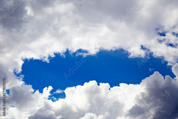 Obraz In the sky with white clouds.