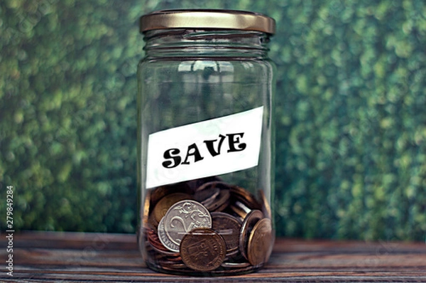 Fototapeta money in the glass with filter effect retro vintage style