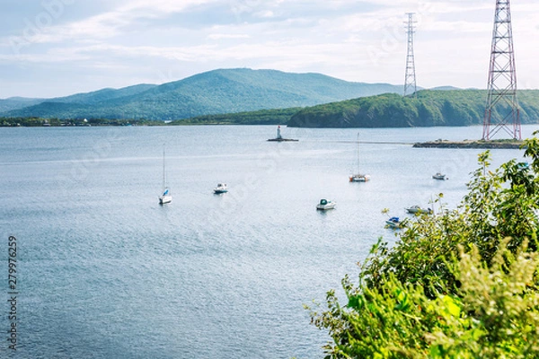 Obraz Yachts in the sea in a beautiful nature among the mountain landscape.