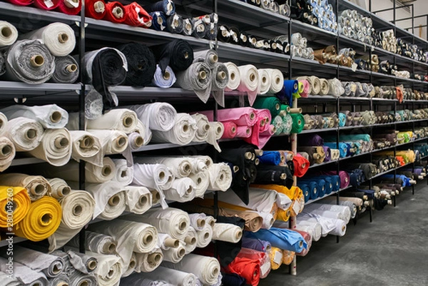 Obraz Fabric warehouse with many multicolored textile rolls
